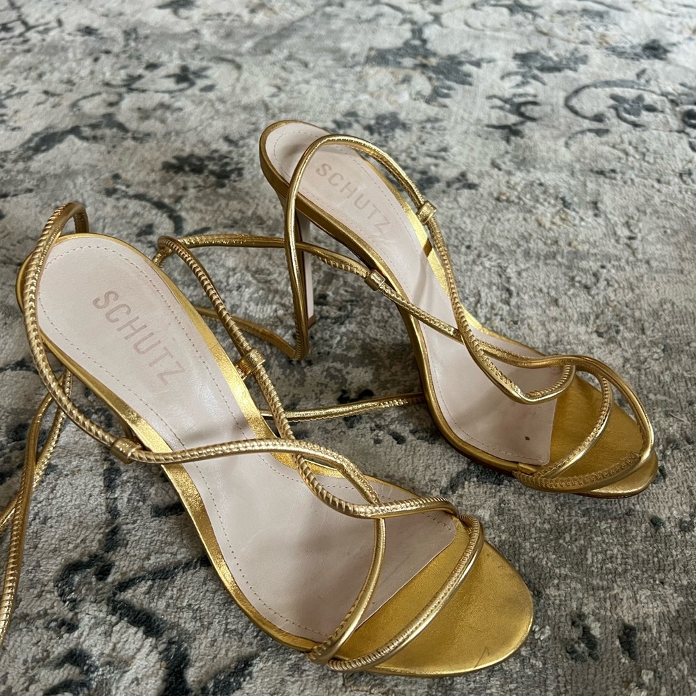 Schultz gold heels